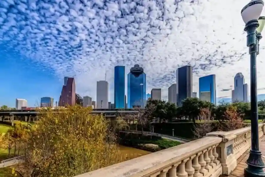 Houston city skyline under blue sky during daytime